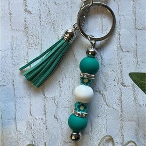 Green and White Beaded Key Holder with Suede Tassel